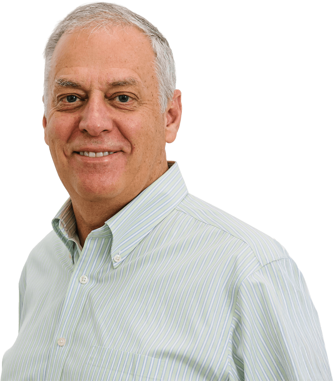Smiling older man in a light green striped shirt, standing against a solid green background, conveying a friendly and approachable demeanor.